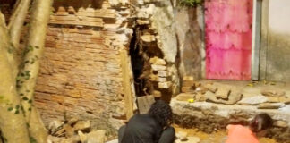 Alunos da Escola de Ofícios Tradicionais de Mariana restauram muro histórico